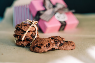 Chocolate cookies and Gift box on wood table