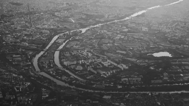Aerial shot of Paris City and Seine River. Black and white.
