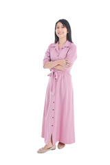 Full length of beautiful asian woman in pink dress doing crossed arm and smiling over white background.