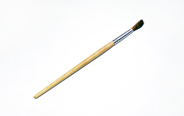 Isolated paint brush for painting on a white background. Brush with bristles. Blank for design.