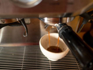 making coffee with espresso machine