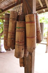 Process to make coconut sugar, in Thailand. Bamboo tube for collecting the sweet sap from the cut...