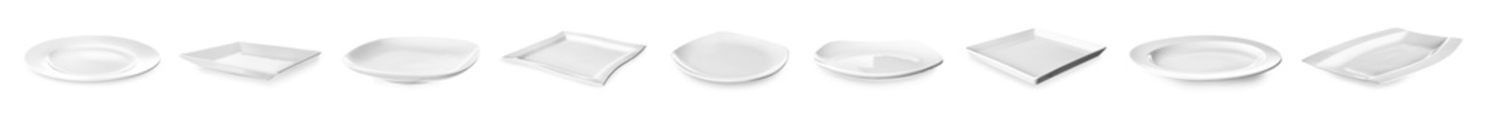 Different ceramic plates on white background