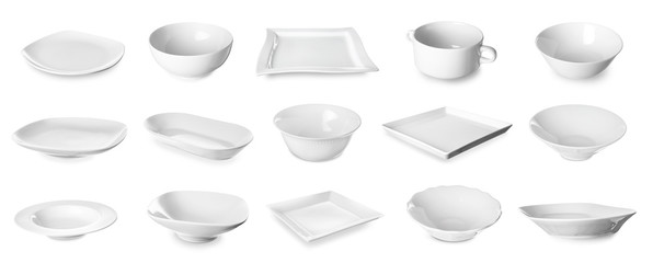Set of empty ceramic dishware on white background