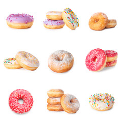 Set of sweet tasty donuts on white background