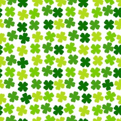 St Patricks Day seamless pattern. Green background with clover leaves. Cute simple repeated design. Vector