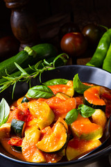 zucchini vegetarian ratatouille with tomato sauce and herbs