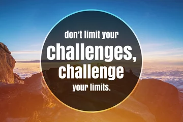 Papier peint photo Citations Inspirational and Motivational Quote. Don't Limit Your Challenges, Challenge Your Limits. Mountain Top Background.  © Constantine