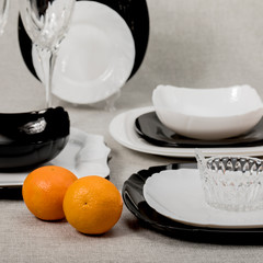 Black and white dishes on a gray background.	