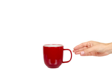 Red porcelain tea cup. Ceramic coffee mug.