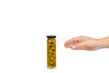 Glass jar with green olives. Canning supply food.