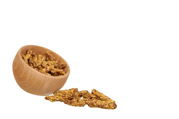Crispy granola, dried fruits with grains. Wooden bowl.