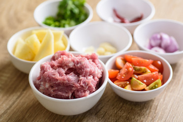 Food ingredients for making Nam Prik Ong, Northern Thai local food