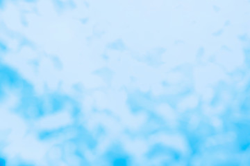 Blurred abstract background of silver and blue sequins