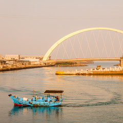 Boat and bridge at Keelung, Taiwan