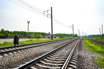 Fototapeta na wymiar Railroad tracks, double track railway, summer time