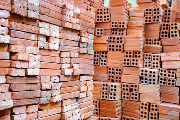 prefabricated bricks, hollow with holes, new, of red orange clay