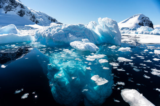 Closeup details of iceberg floating in the cold water of Antarctica
