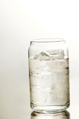 Cold water in can shaped glass 