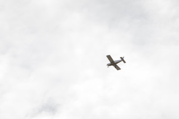 small airplane in sky