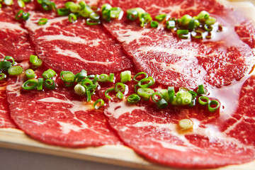 Yakiniku, thin sliced beef with scallion 