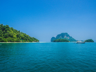 Fototapeta premium Asia Thailand have beach,sand,sun,sea and sky blue for summer vocation and travel relax holiday paradise landscape nature on the beautiful and There are many islands and floating boats.