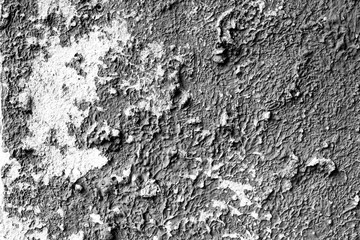 Texture of a concrete wall with cracks and scratches which can be used as a background