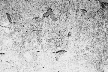 Texture of a concrete wall with cracks and scratches which can be used as a background