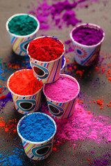 Obraz na płótnie Canvas Indian festival holi, colors in plastic cup