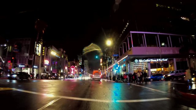 timelapse journey at Christmas down Hollywood Bld. In rain with holiday lights