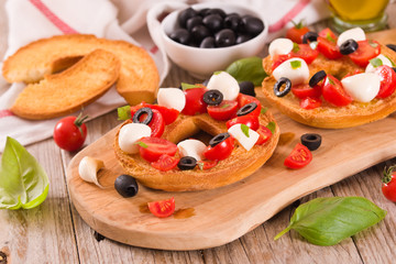 Friselle with tomatoes and mozzarella cheese.