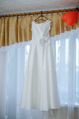 Beautiful vist bride dress in the house. Wedding morning