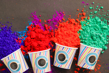 Indian festival holi, colors in plastic cup