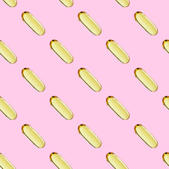 Trendy seamless capsules pattern – omega 3, medicine pills or tablets on pink background. Health care concept, creative design, minimal art
