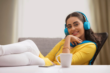 Single woman listening to music. 