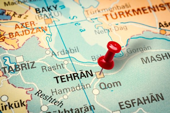 Pushpin pointing at Teheran city in Iran