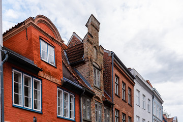 Fototapeta na wymiar Colorful old gable houses in historic centre of Lubeck, Germany