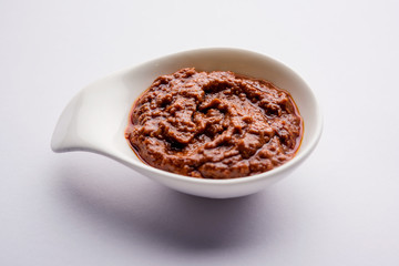 Homemade Tandoori Paste or Marinade mixture, in a bowl. used for grilled chicken or Paneer or vegetable. selective focus
