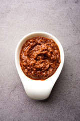 Homemade Tandoori Paste or Marinade mixture, in a bowl. used for grilled chicken or Paneer or vegetable. selective focus