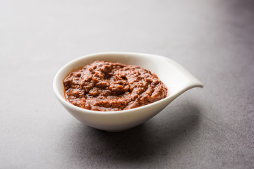 Homemade Tandoori Paste or Marinade mixture, in a bowl. used for grilled chicken or Paneer or vegetable. selective focus