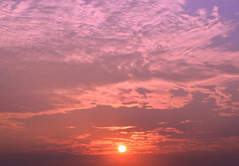 Fototapeta premium The sky and the light of the sun surrounded by clouds