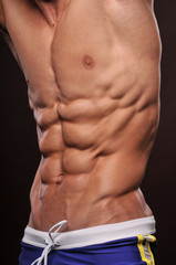 Muscled male abs