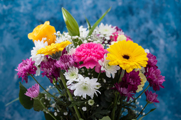 bouquet of beautiful flowers  with blue background