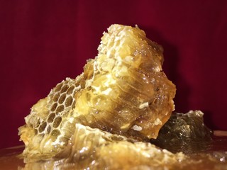 abstract hexagonal background natural fresh golden liquid honey honeycombs