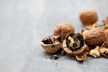 fresh dry walnut on ceramic background