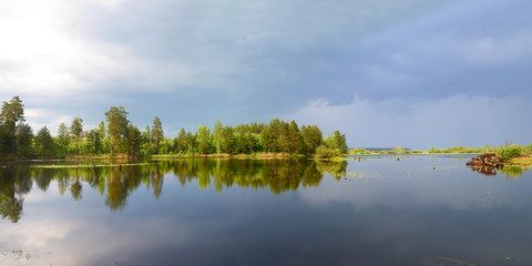 Autumn fishing on the Rybinsk Reservoir, beautiful panorama.