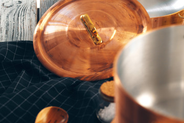 New copper cookware for professional kitchen close up