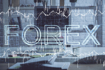 Double exposure of forex graph and work space with computer. Concept of international online trading.
