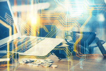 Multi exposure of table with computer and world map hologram. International data network concept.
