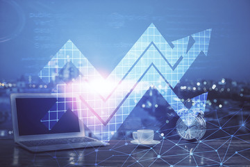 Computer on desktop with point up arrows hologram. Double exposure. Concept of success.